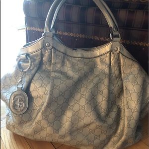 Authentic Gucci silver hobo bag